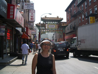 Patti in chinatown with the arch in background