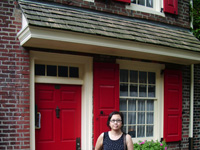 First house on the left, complete with bright red paint