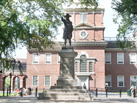 Statue of patriot in the square behind Independence Hall